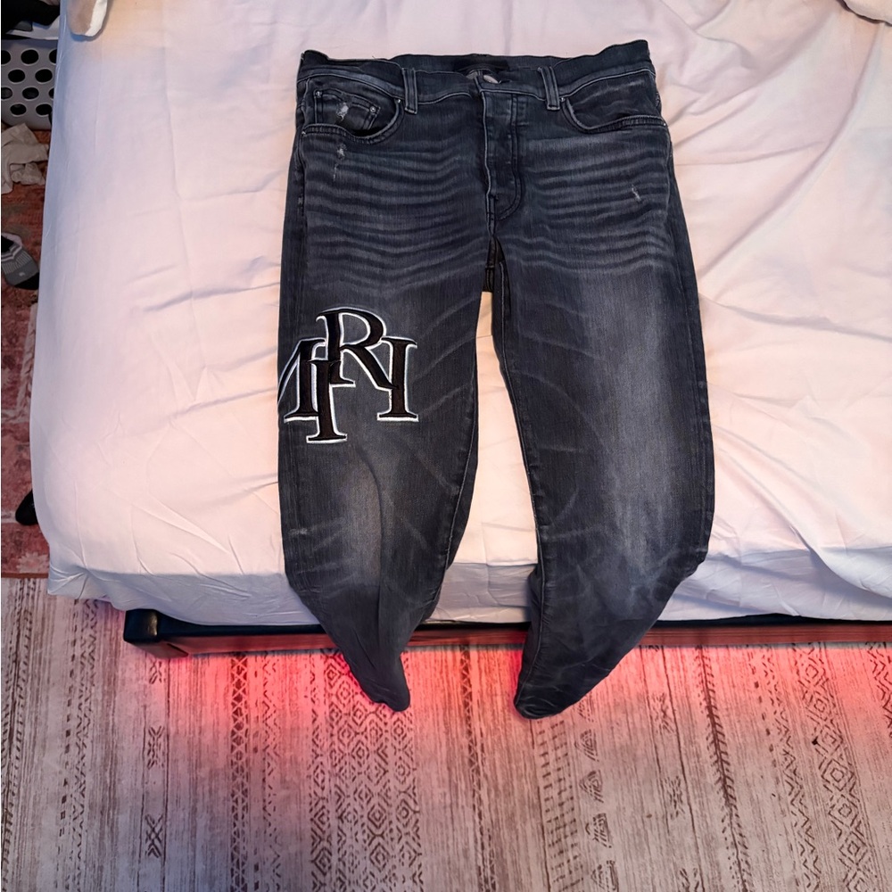 Gray Amiri Staggered logo jeans